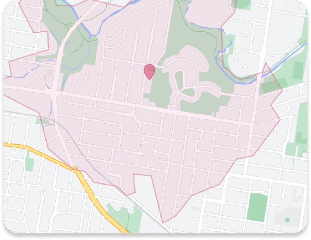 Geographic information system (GIS) map with marker and travel boundary (isochrone) defined.